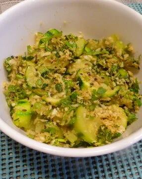 A bowl of food on the table