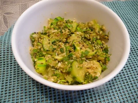 A bowl of food on the table