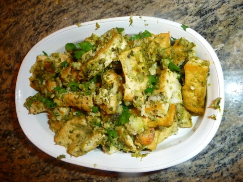 A white plate of food on top of a table.