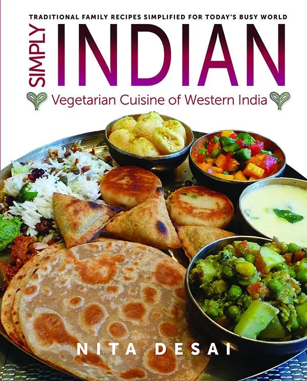 A book cover with indian food on it